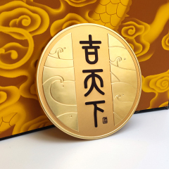 Circular black and gold color-blocked embossed metal wine label