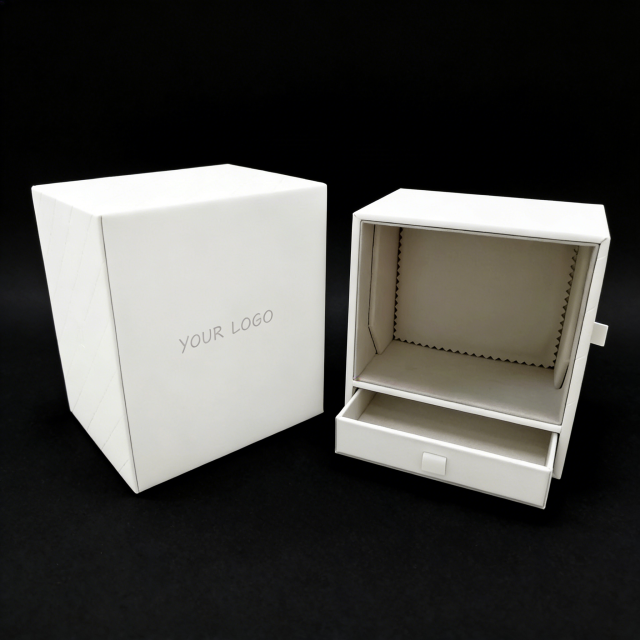 Boîte à bijoux de présentation en cuir PU blanc,