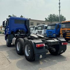 China National Heavy Duty Truck Group (SINOTRUK) HOWO NX 6×4 380HP Used Tractor Truck (Blue (main color) with silver/gray grille and black accents)
