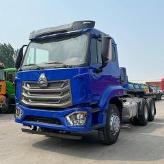 China National Heavy Duty Truck Group (SINOTRUK) HOWO NX 6×4 380HP Used Tractor Truck (Blue (main color) with silver/gray grille and black accents)
