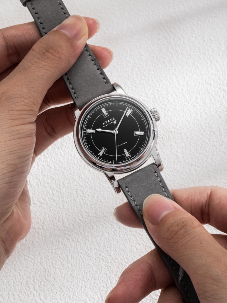 Black dial with diamond