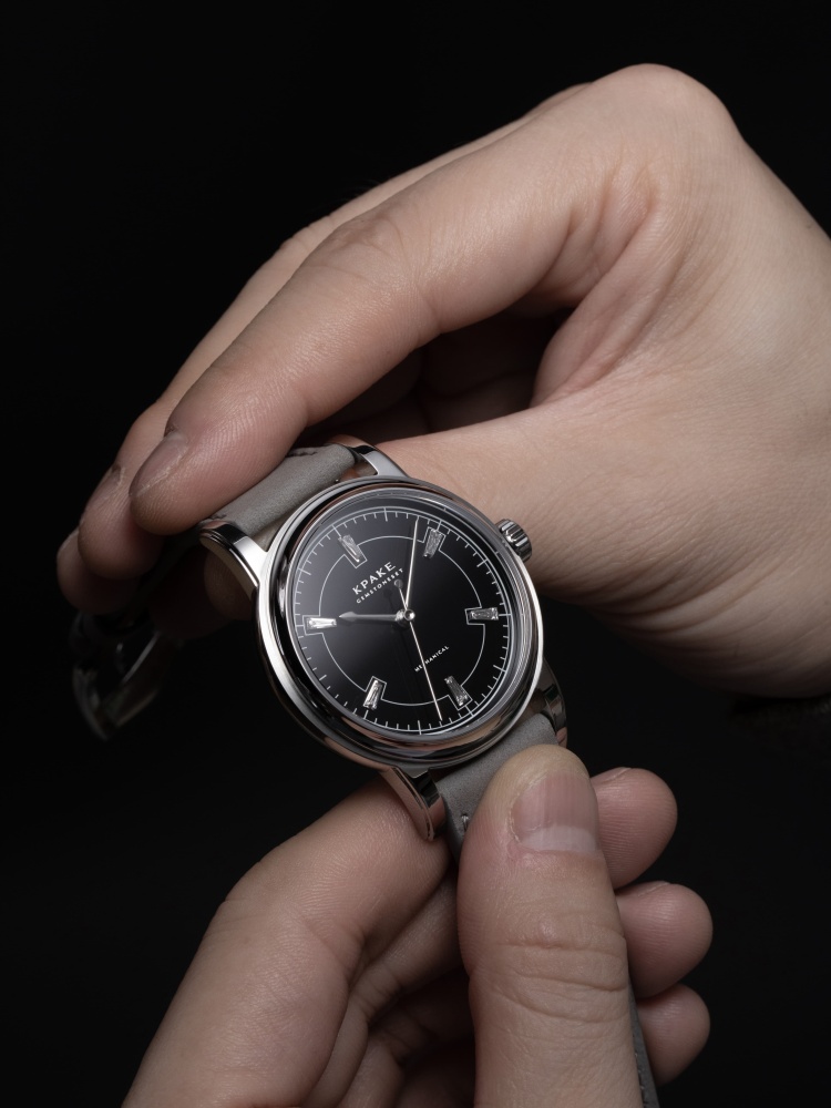 Black dial with diamond