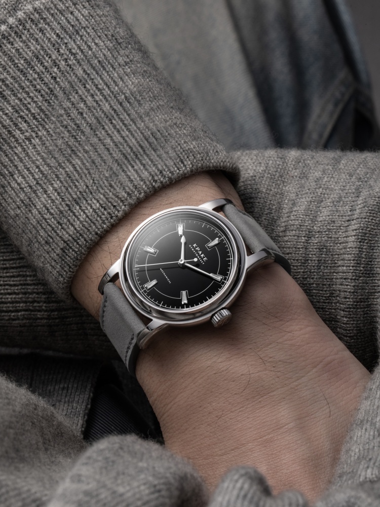 Black dial with diamond