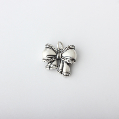 999 Sterling Silver Bow Charm