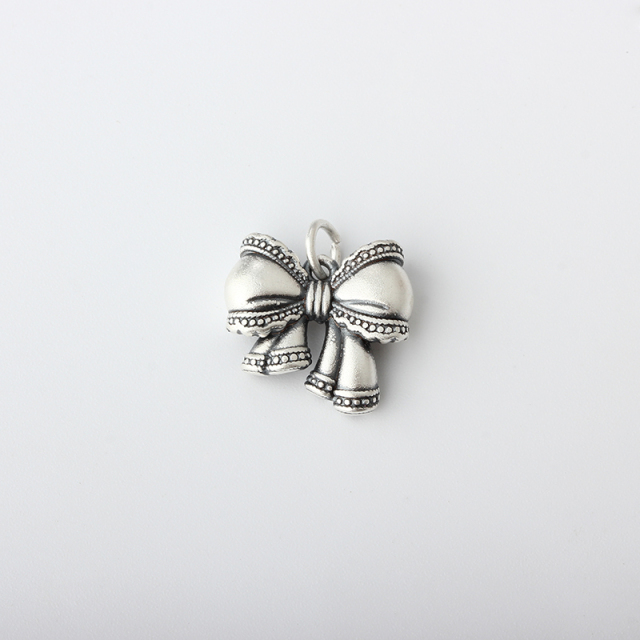999 Sterling Silver Bow Charm