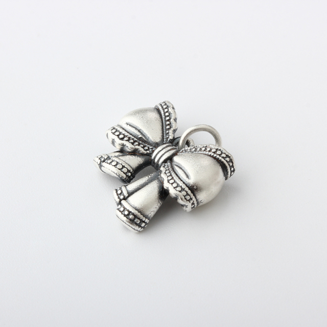 999 Sterling Silver Bow Charm