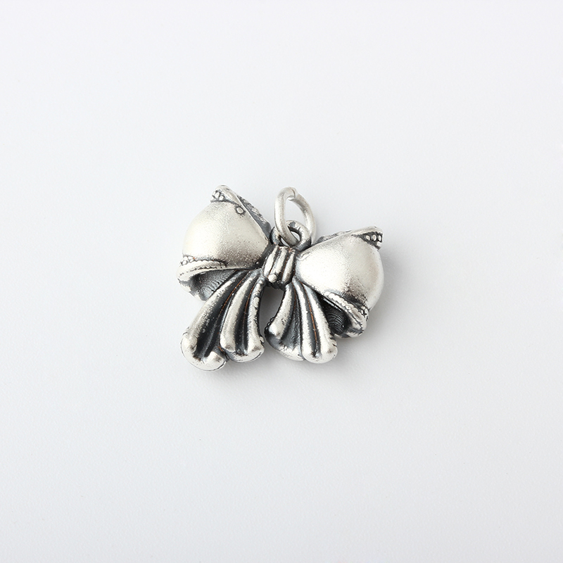 999 Sterling Silver Bow Charm
