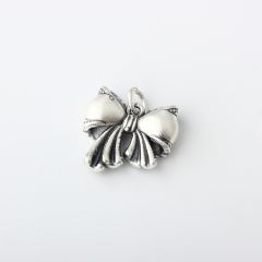 999 Sterling Silver Bow Charm