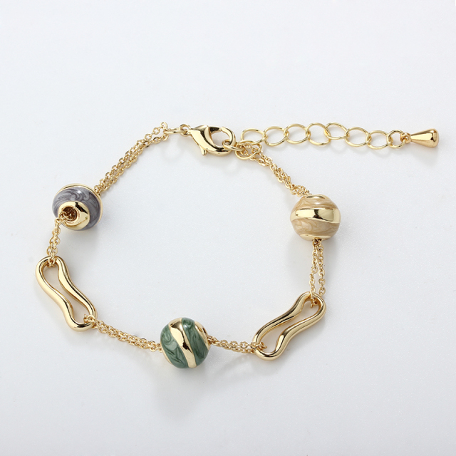 Gold-Tone Copper Bracelet with Marble Swirl Beads & Abstract Links
