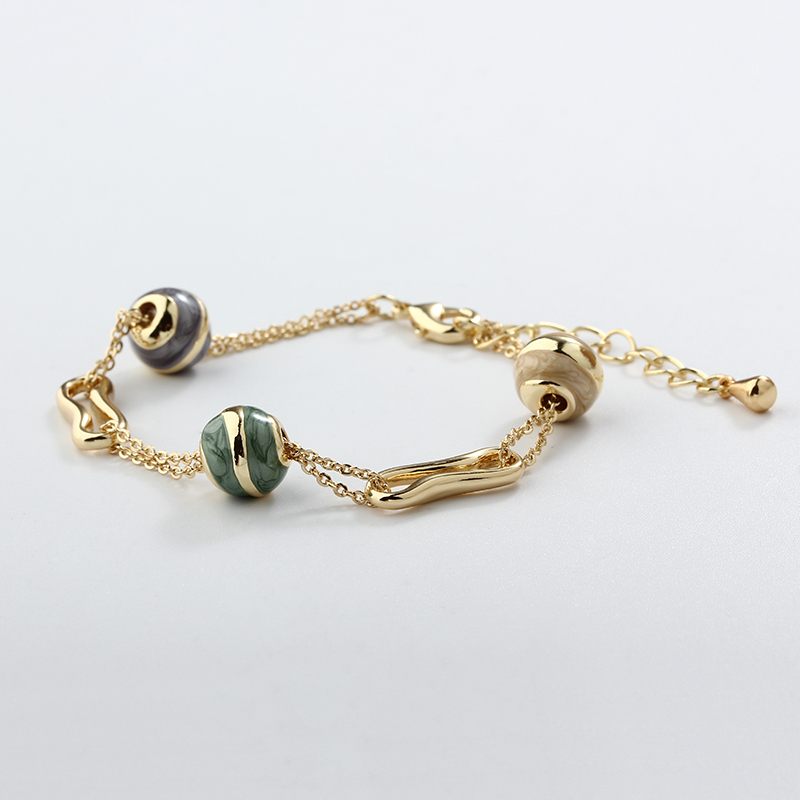 Gold-Tone Copper Bracelet with Marble Swirl Beads & Abstract Links