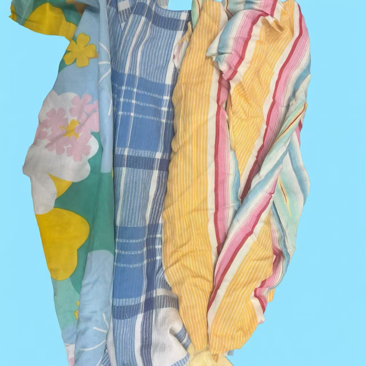 EcoWipePro mixed colored sheeting rags – economical low-lint linen wipers for general maintenance and machine shops.