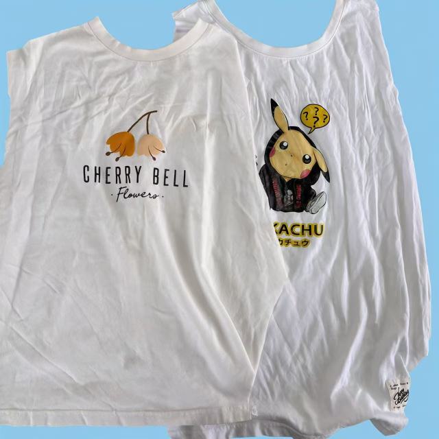 Close-up of printed white T-shirt knit rags showing white background with printed graphics, stain visibility on unprinted areas.