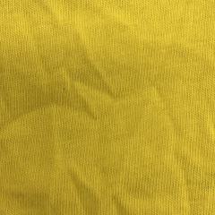 Close-up of mill ends new cotton wipers showing assorted irregular pieces, ideal for cost-sensitive applications.