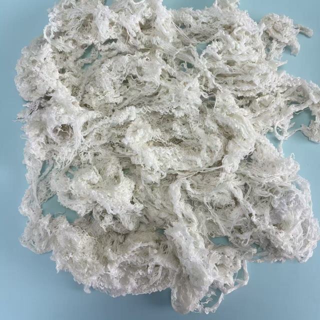 EcoWipePro pure white hand-sorted cotton yarn waste – premium oil sorbent for marine engine rooms, high-visibility applications.