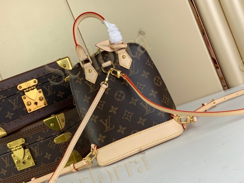 LV Alma Backpack