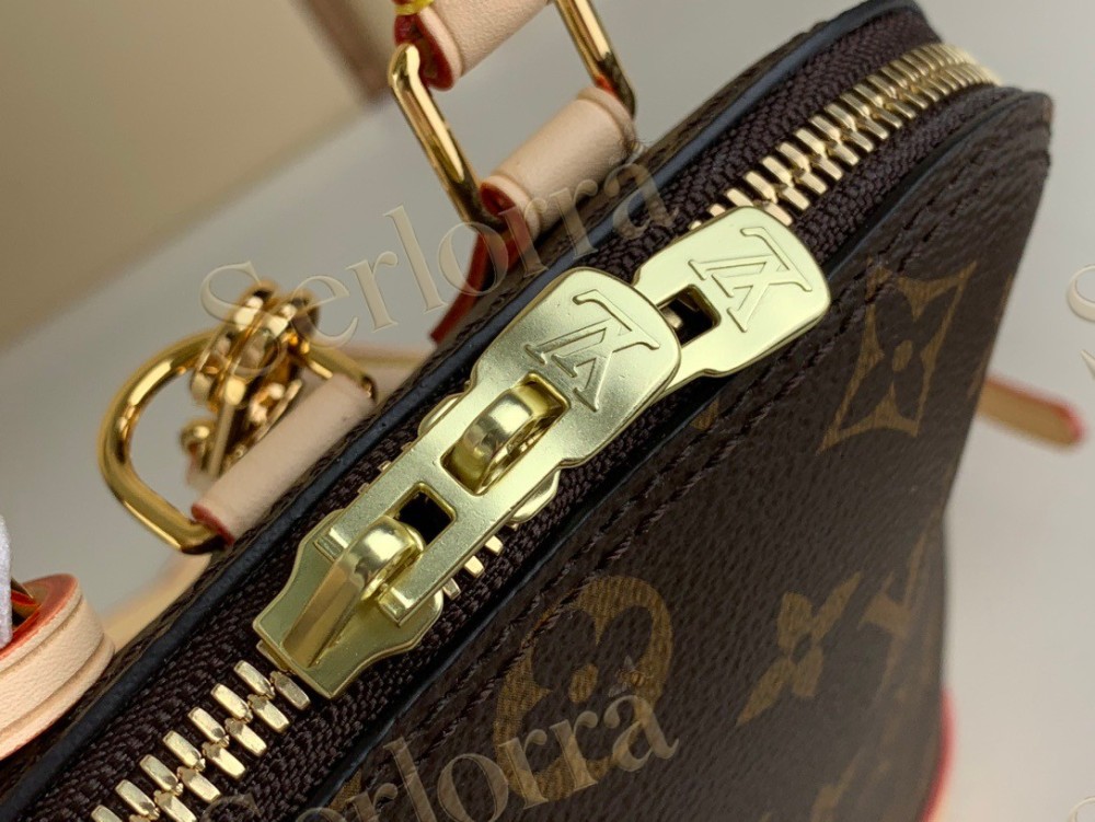 LV Alma Backpack