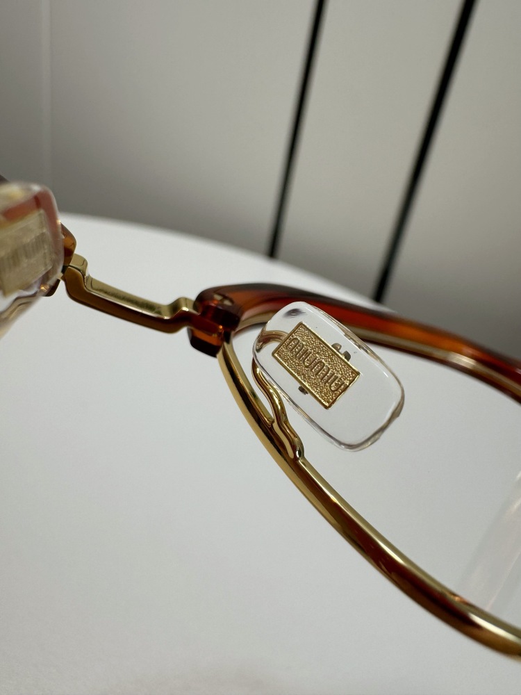 MIU MIU glasses