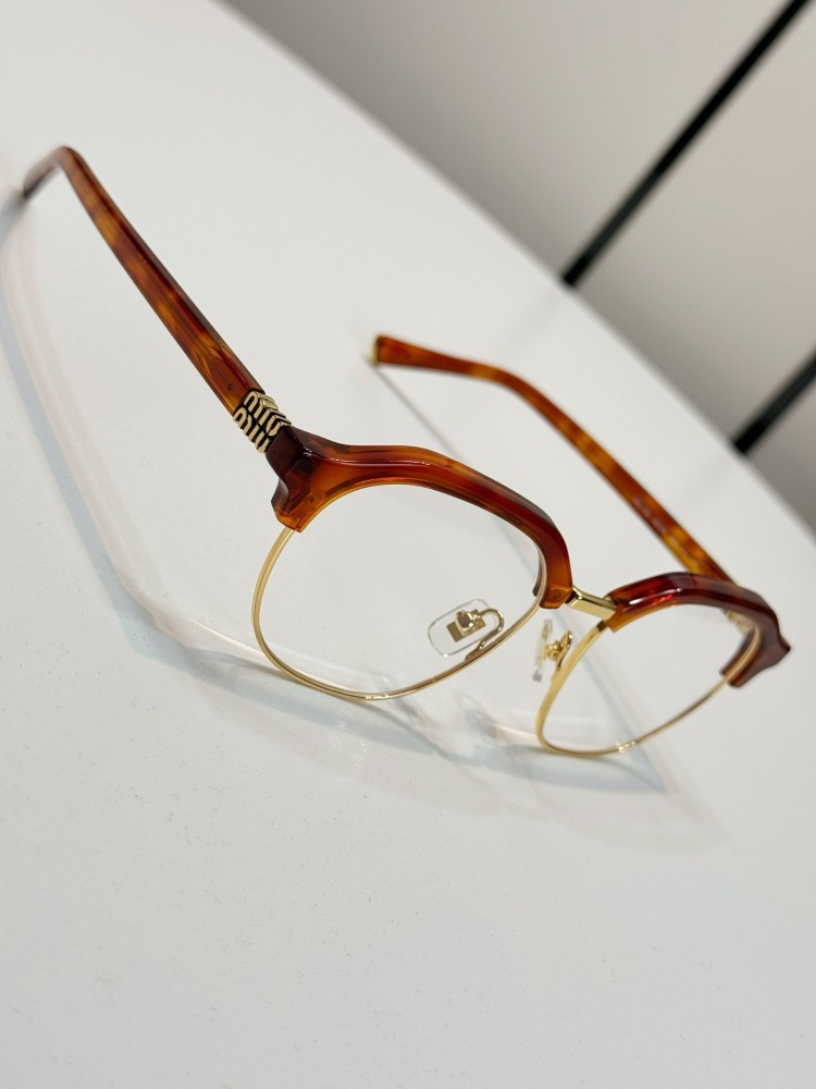 MIU MIU glasses
