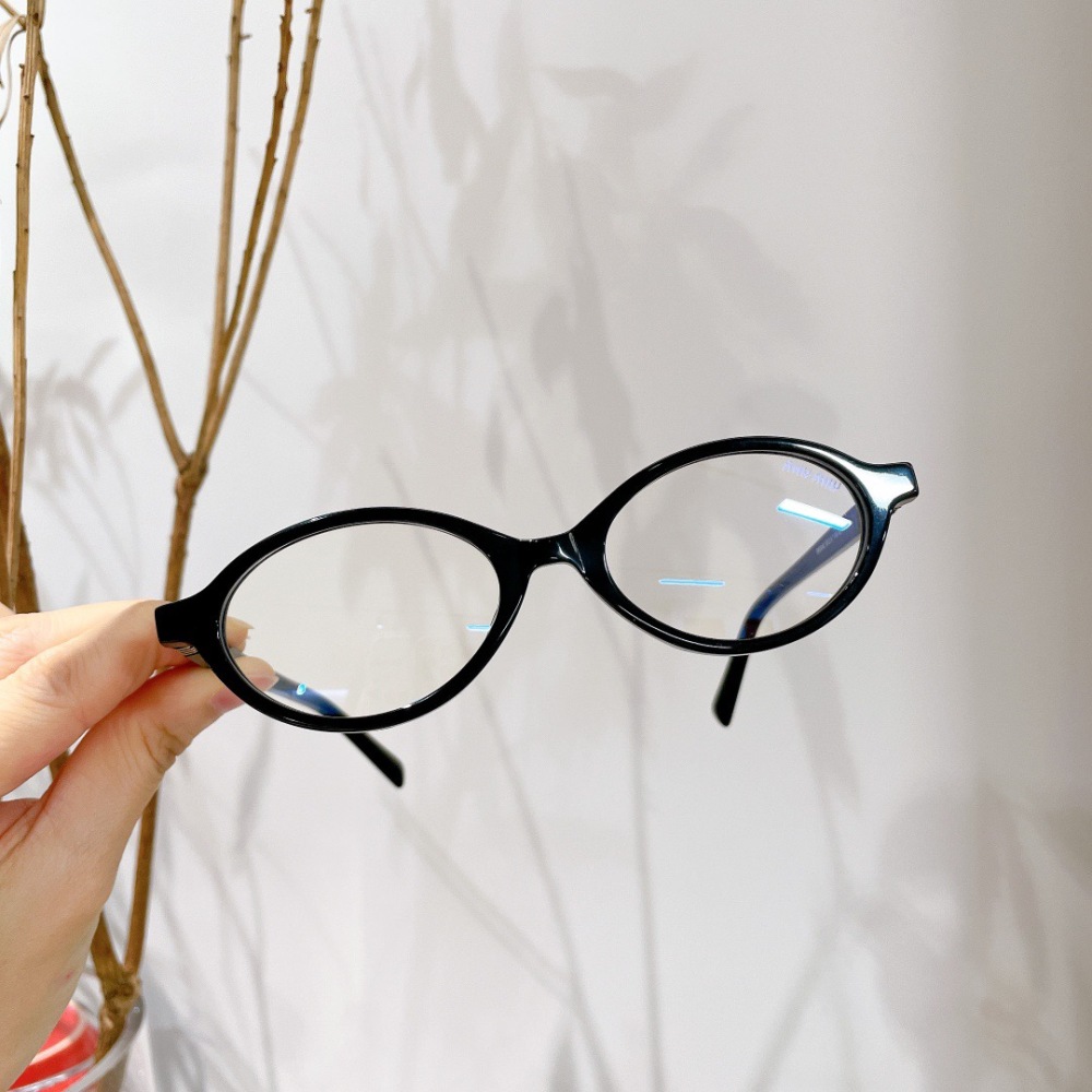 MIU MIU glasses