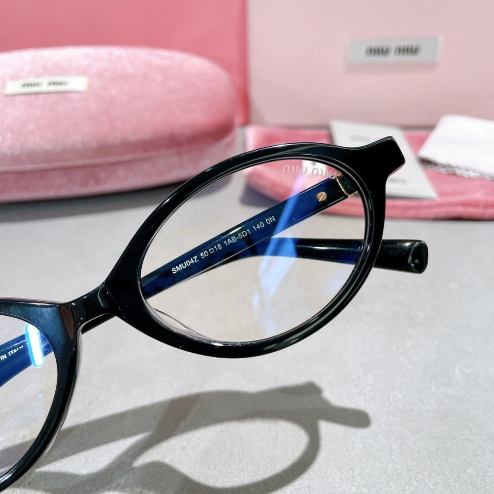 MIU MIU glasses