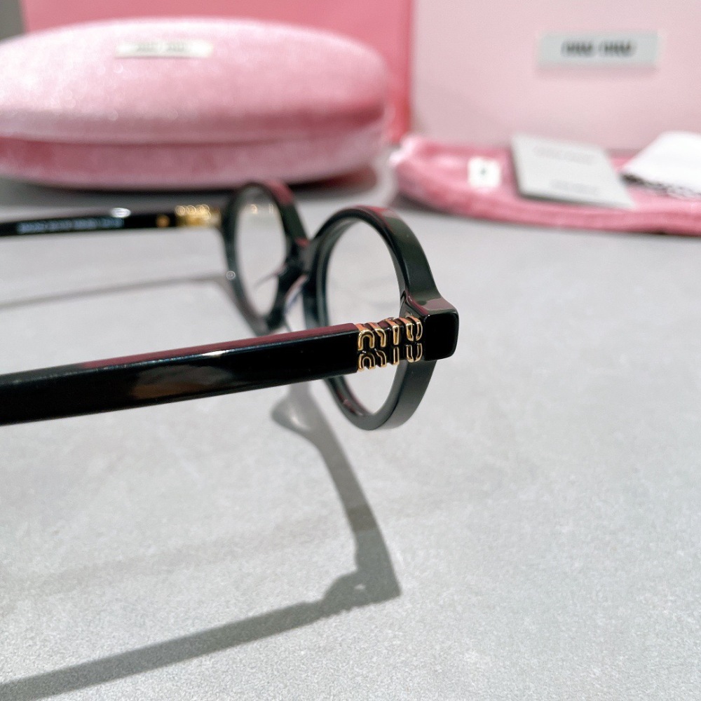 MIU MIU glasses