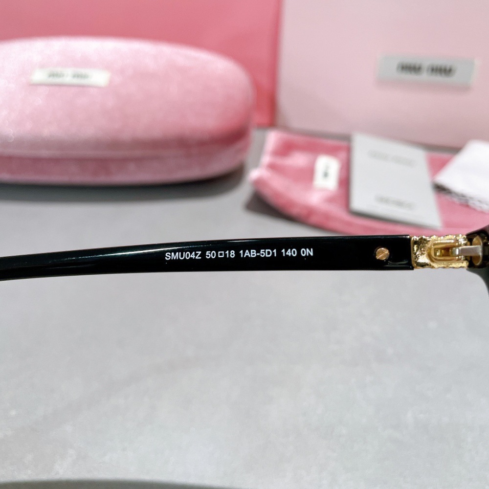MIU MIU glasses