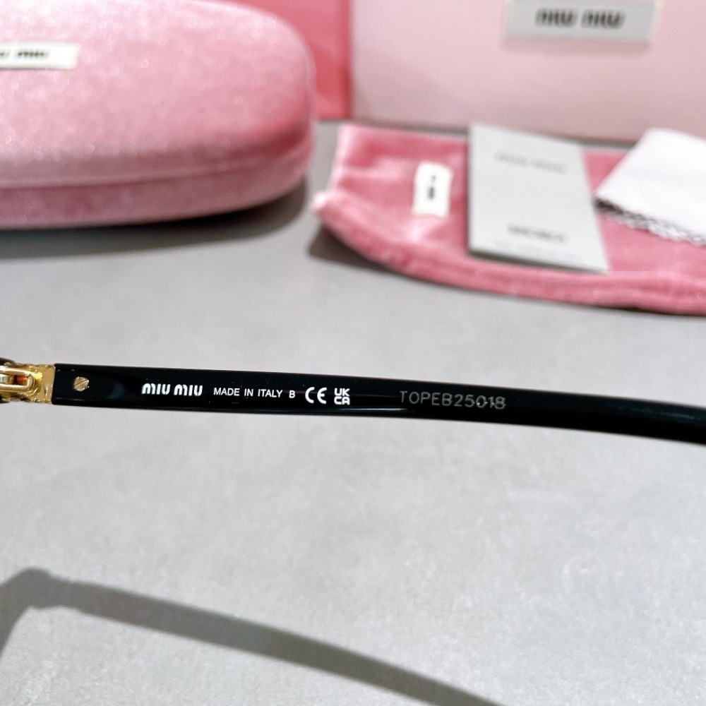 MIU MIU glasses