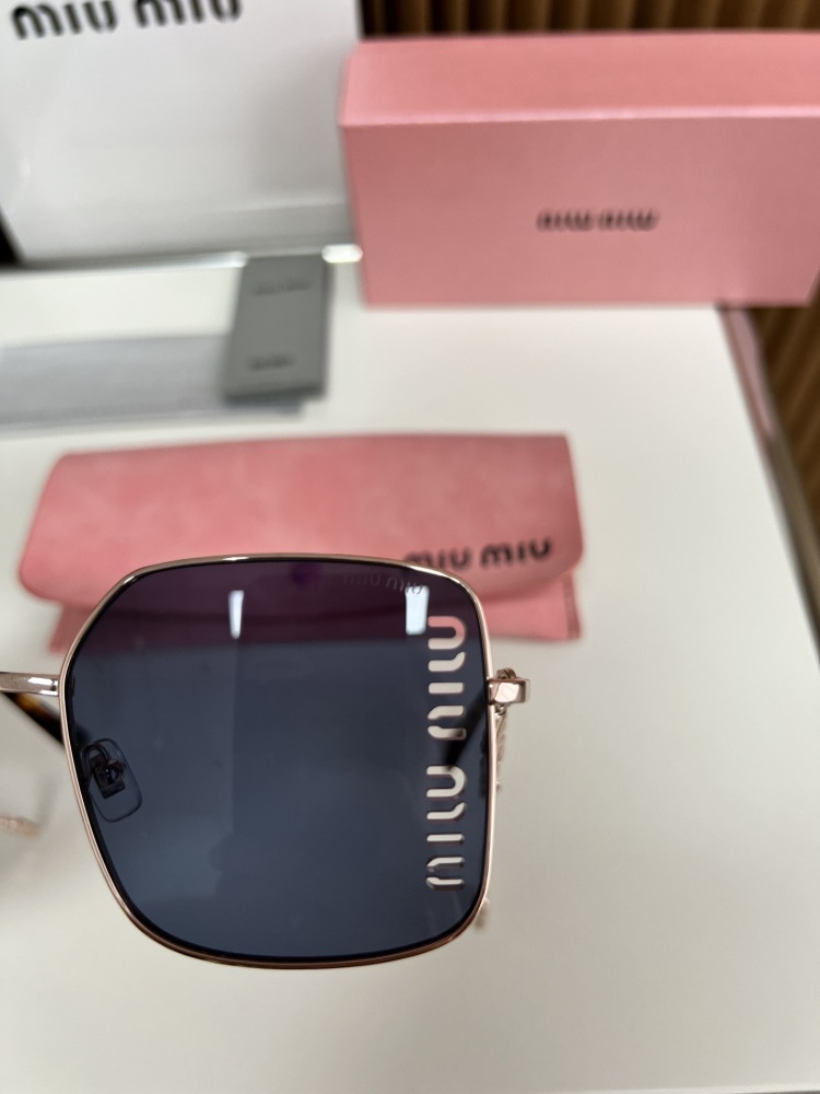 MIU MIU glasses