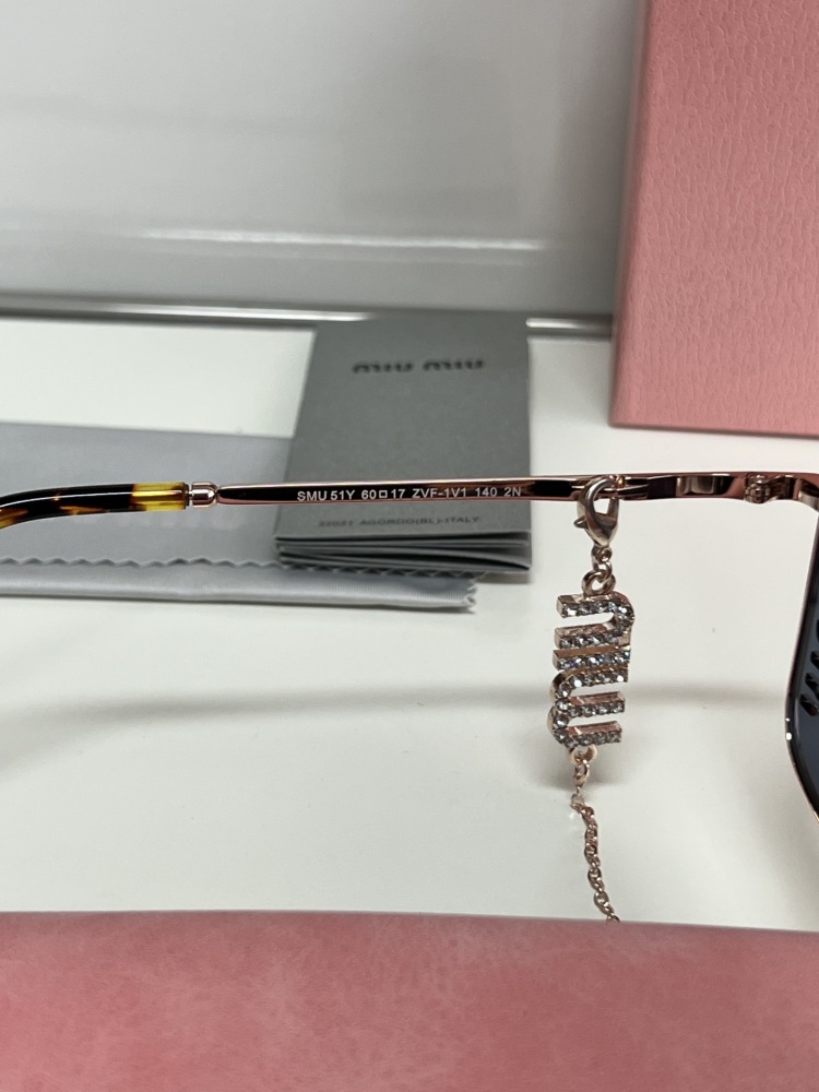 MIU MIU glasses