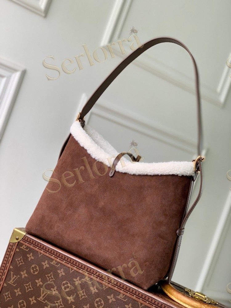 LOUIS VUITTON CARRYALL PM