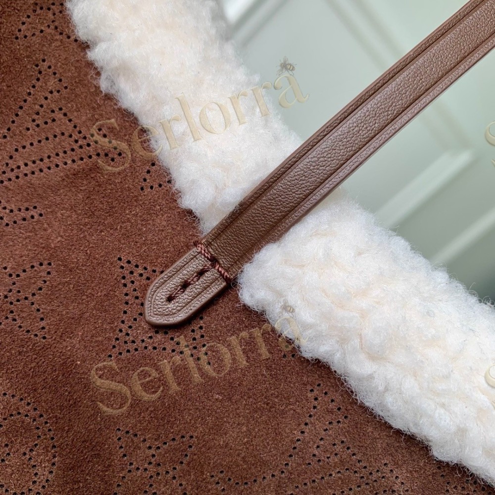 LOUIS VUITTON CARRYALL PM
