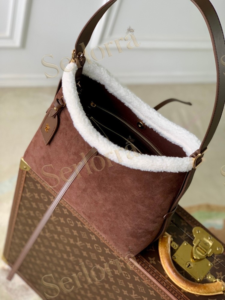 LOUIS VUITTON CARRYALL PM