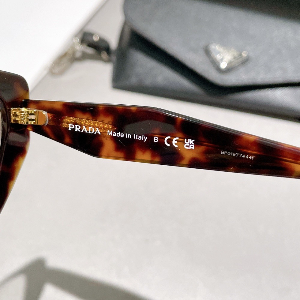 PRADA GLASSES