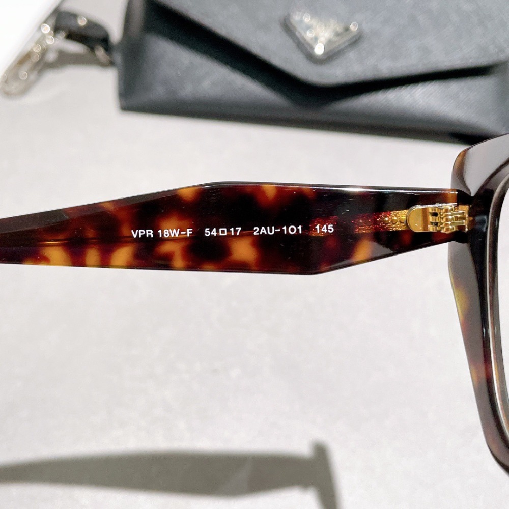 PRADA GLASSES
