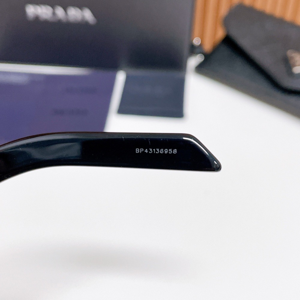 PRADA SUNGLASSES