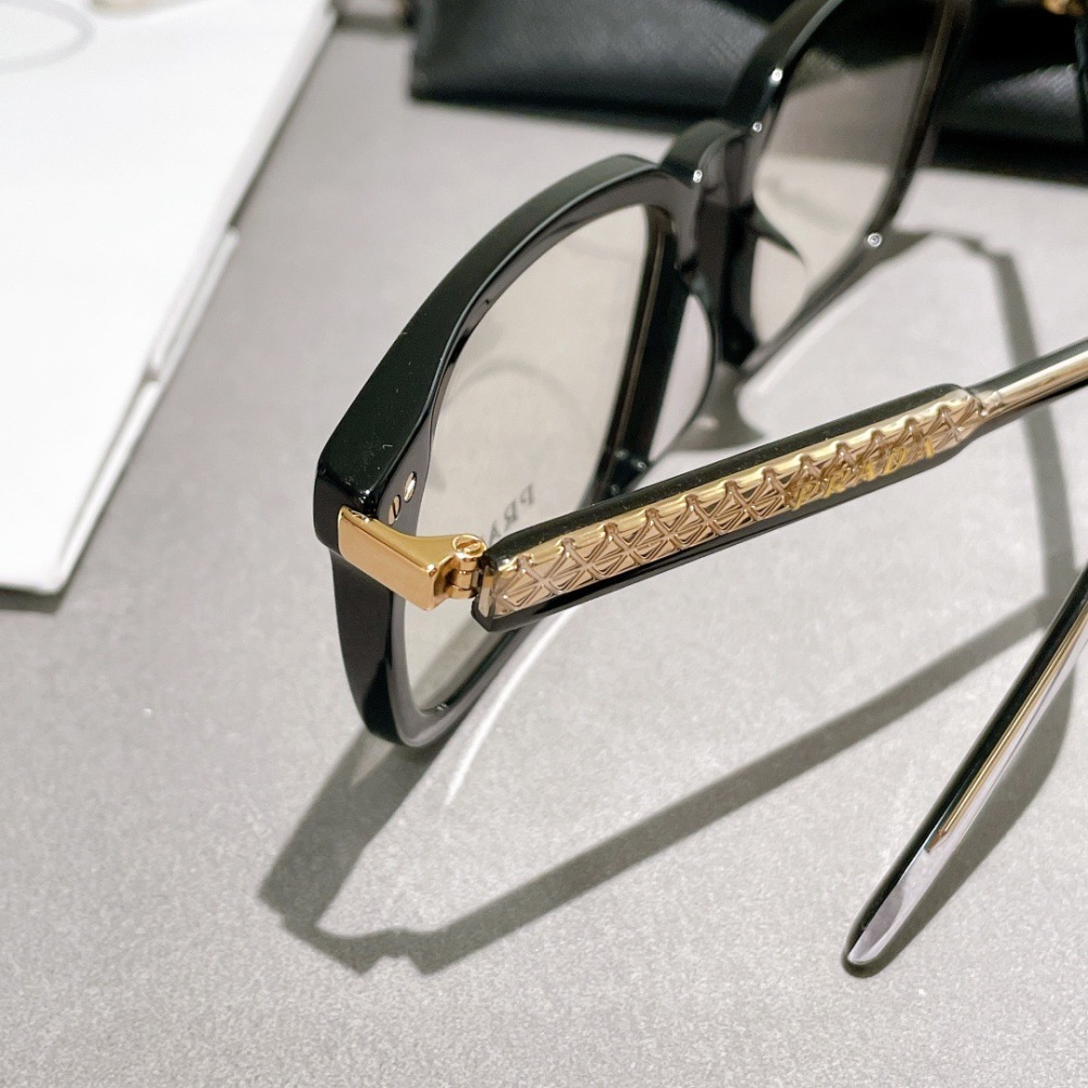 PRADA SUNGLASSES