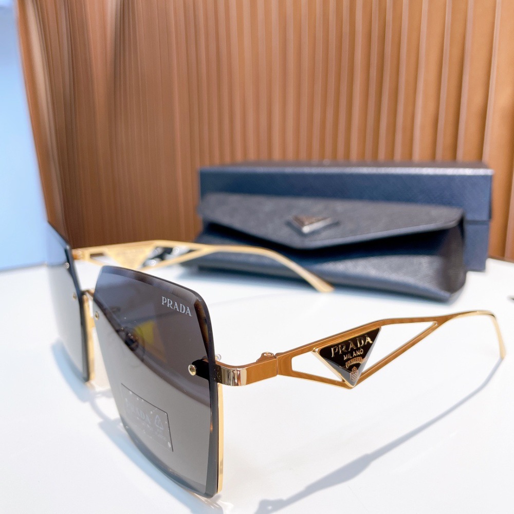 PRADA SUNGLASSES