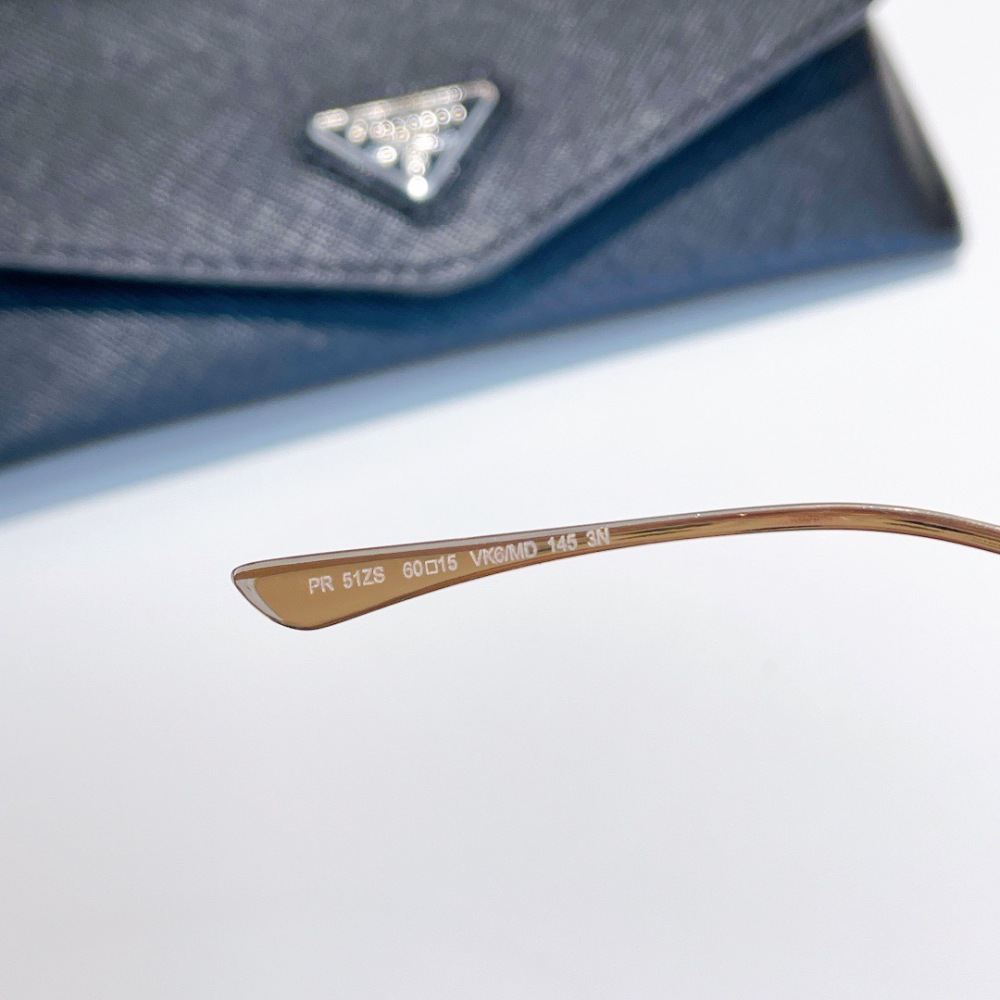 PRADA SUNGLASSES