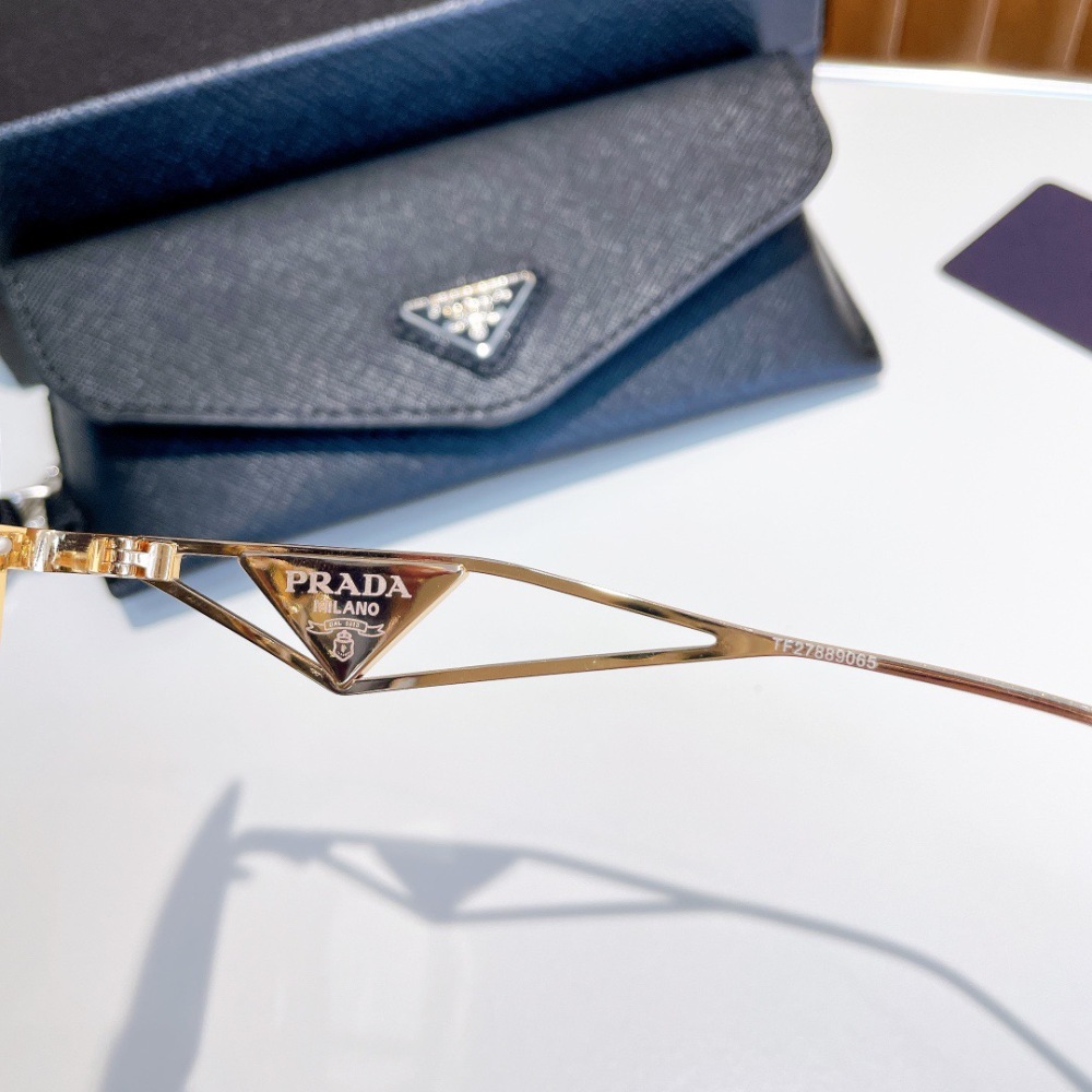 PRADA SUNGLASSES