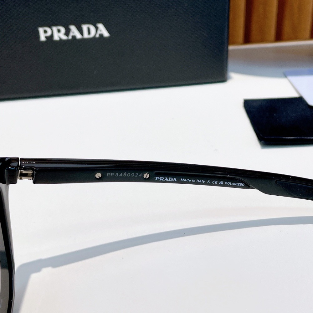 PRADA SUNGLASSES
