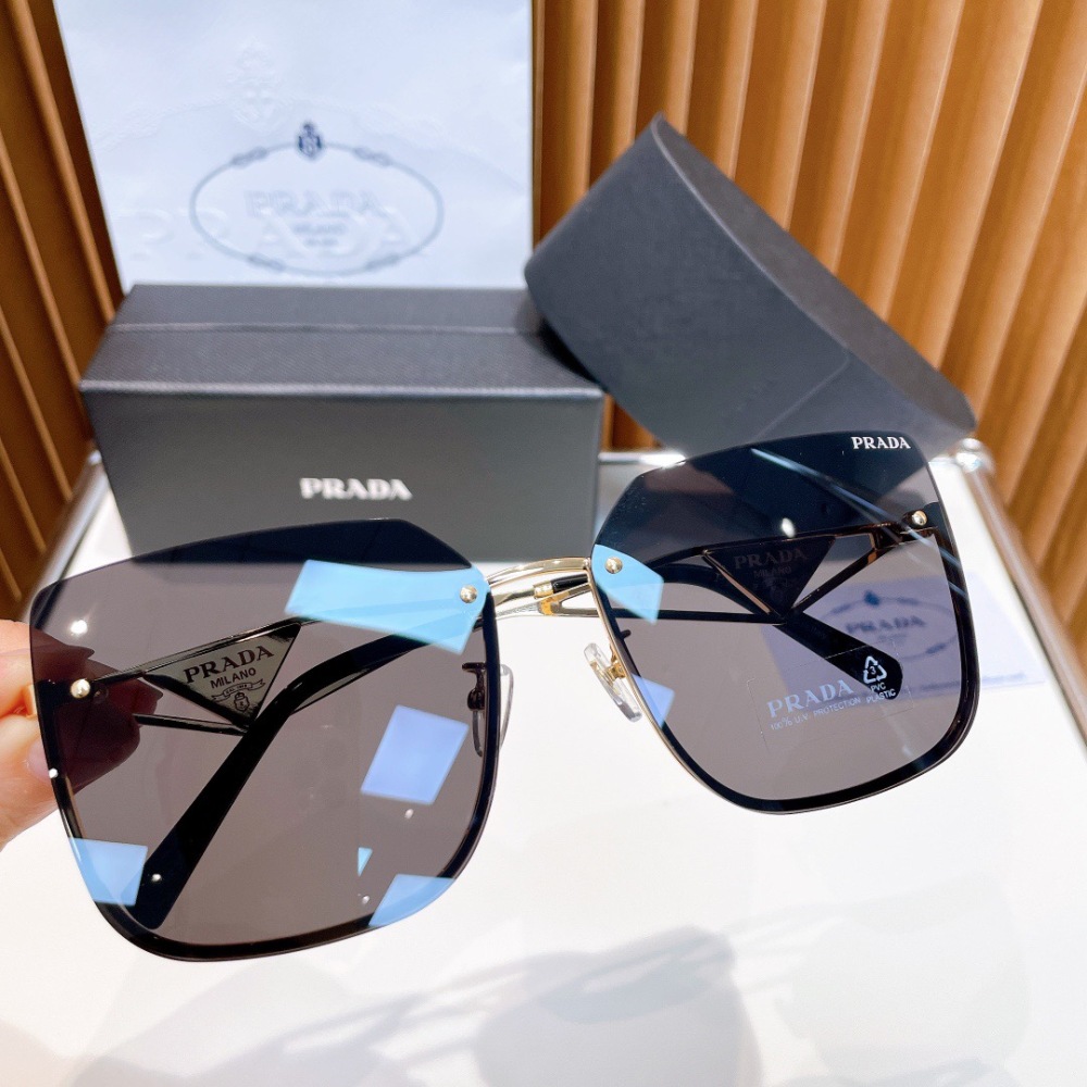 PRADA SUNGLASSES