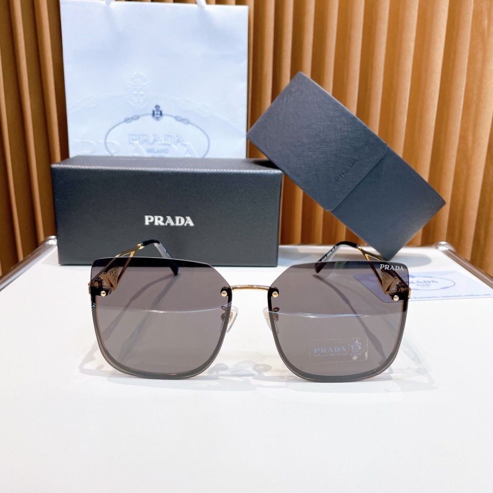 PRADA SUNGLASSES