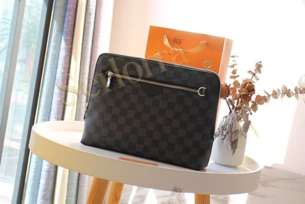 LOUIS VUITTON TAKEOFF POUCH