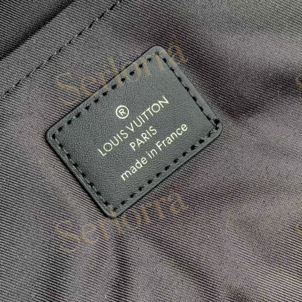 LOUIS VUITTON DISCOVERY SLIM BACKPACK
