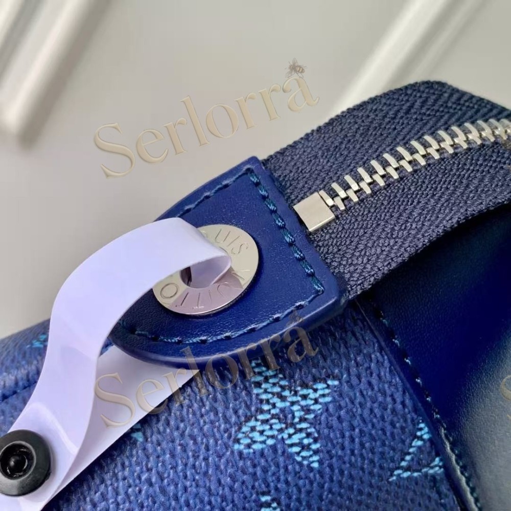 LOUIS VUITTON POCHETTE VOYAGE SOUPLE