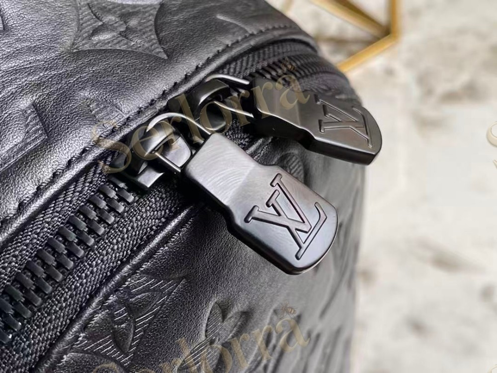 LOUIS VUITTON RACER SLINGBAG