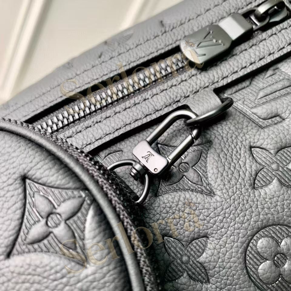 LOUIS VUITTON DUO SLINGBAG