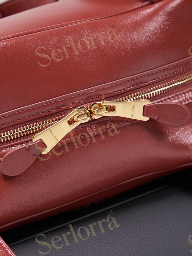 MIU MIU BAULLET LEATHER BAG