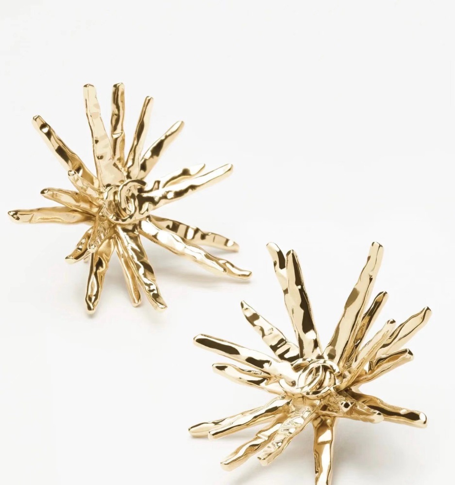 CHANEL GOLD TEXTURED STARBURST METAL EARRINGS