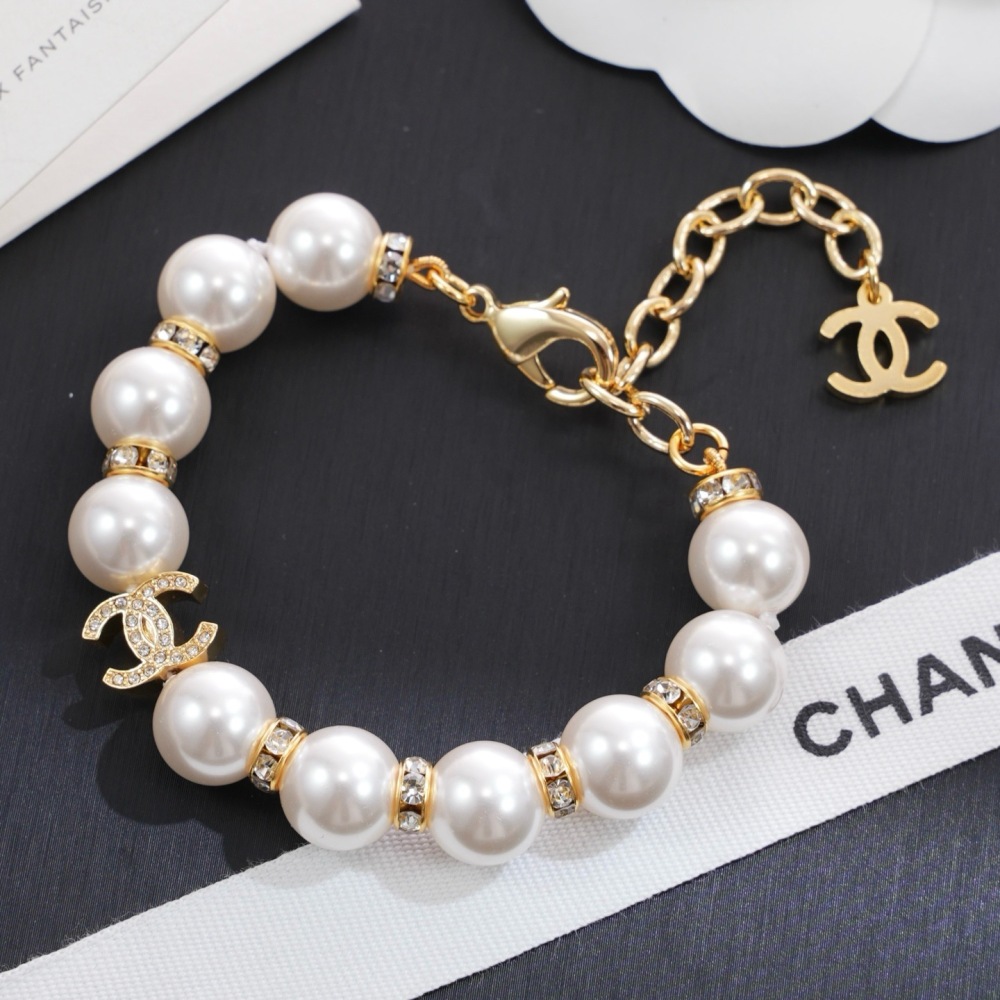 CHANEL CRYSTAL CC PEARL BRACELET